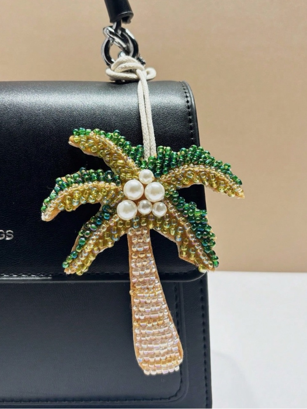 Buy now! Palm tree beaded bag charm